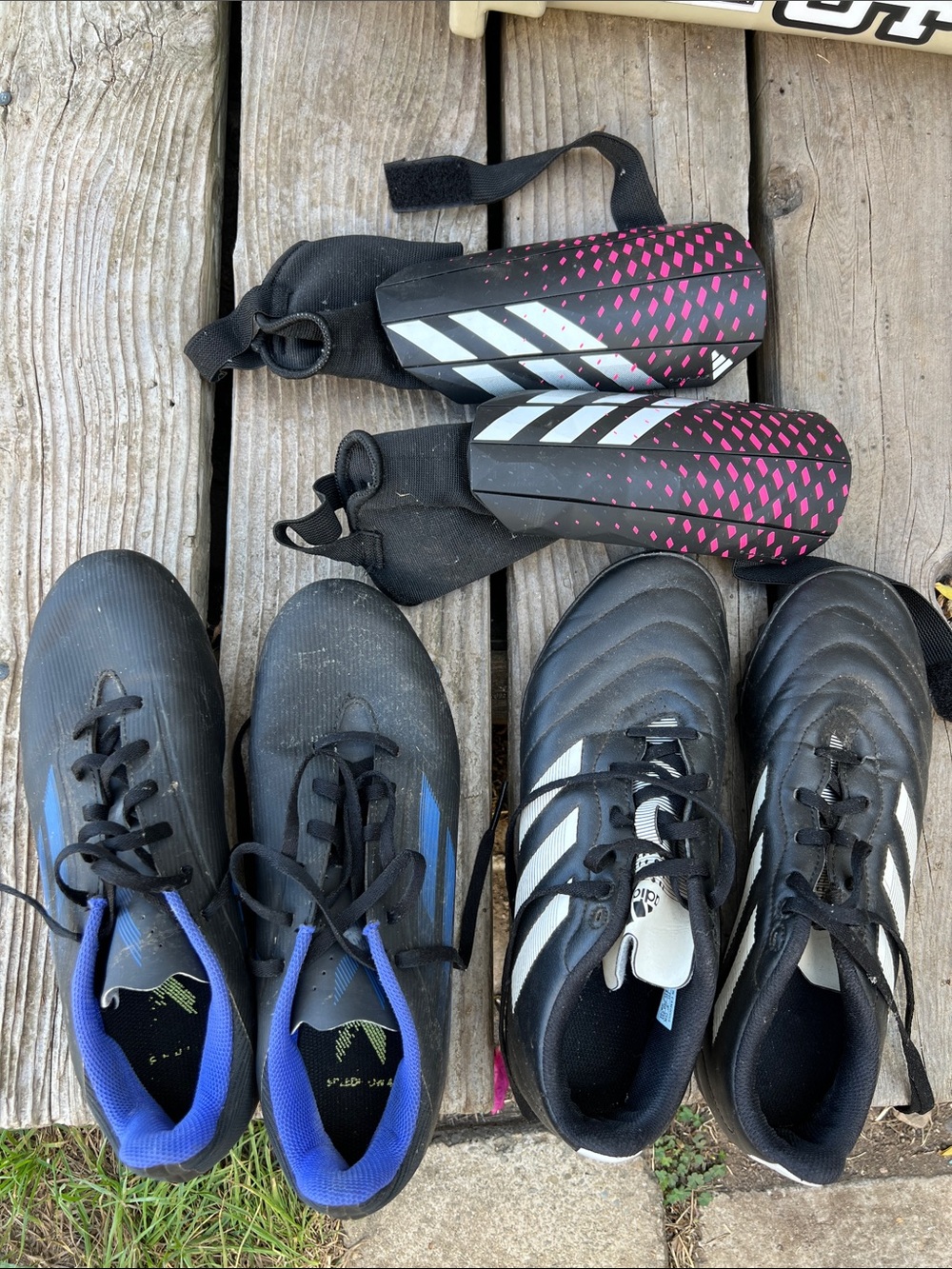 adidas Women’s Black Soccer Cleats for field and turf, and shin guards